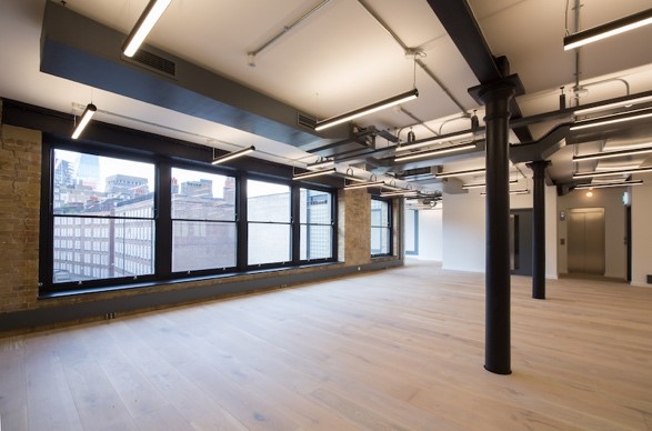 well lit workroom with wooden flooring in Southwark