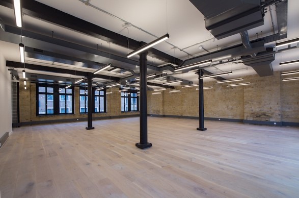 open serviced office space with exposed brick walls in SE1