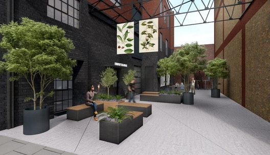 courtyard with block benches, plants and trees outside refurbished warehouse in Southwark