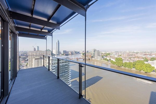 balcony from an upper floor with glass exteriors offer spectacular views over the River Thames